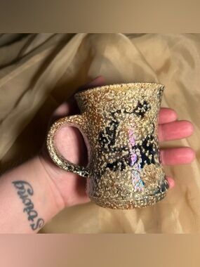 Small handmade iridescent pottery mug